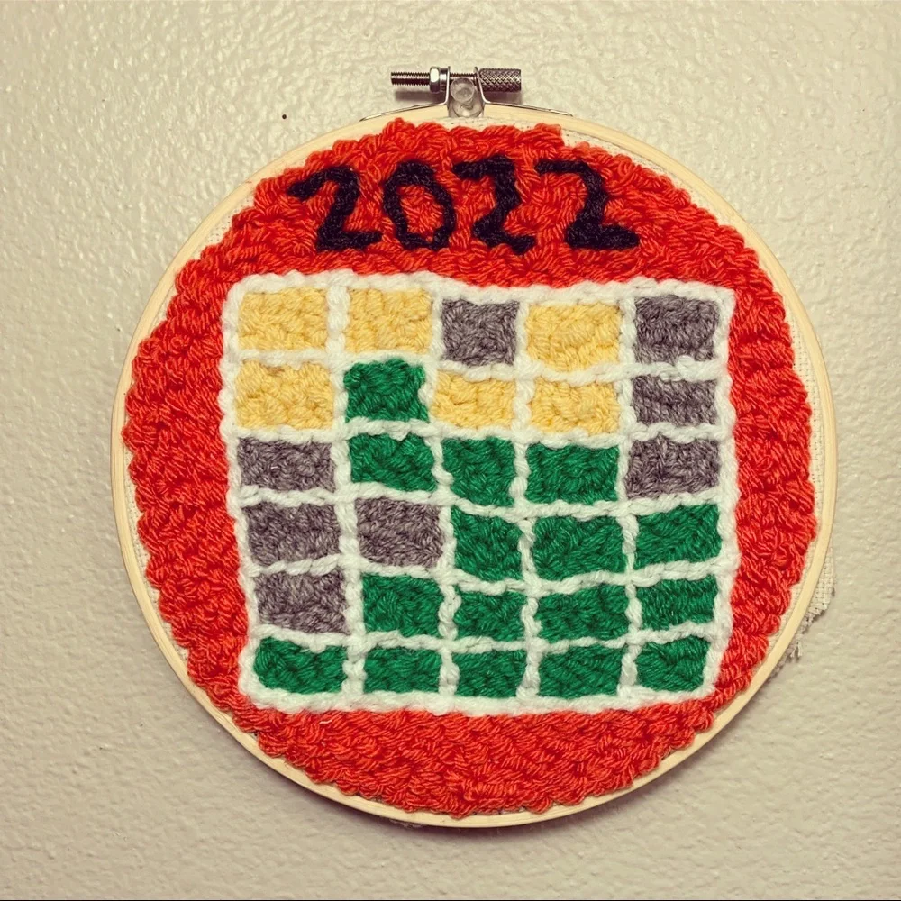 Word(le) Up! Punch needle wall art.